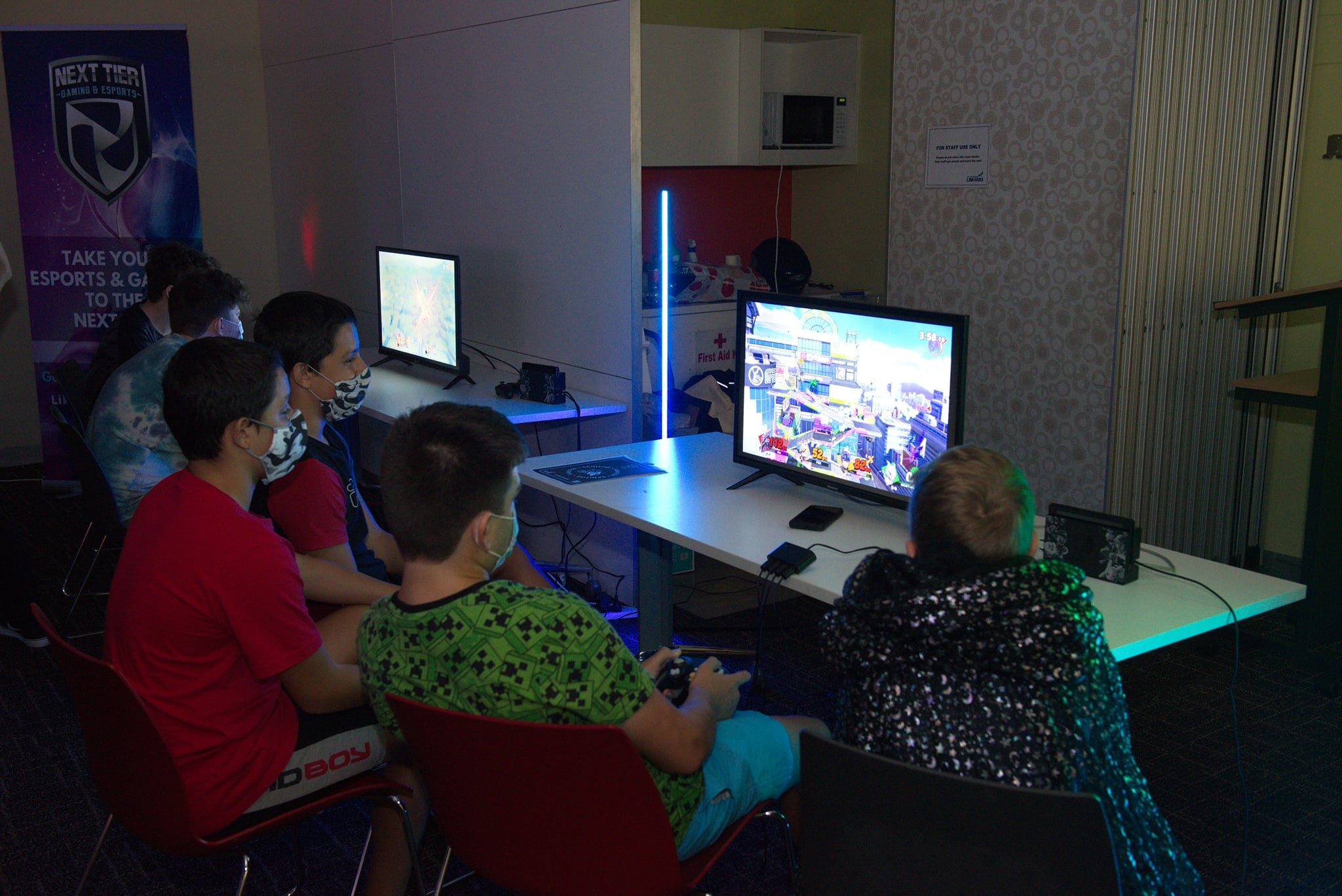 young people playing video games